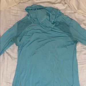 turquoise athletic shirt